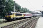 NS 1738 has just brought in an EETC night train to Alessandria in 's Hertogenbosch on 9 August 2013. After the loco has run round, a set of loaded car transporters will be coupled behind the train.