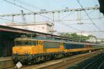 On 16 May 2002 NS 1742 stands at Arnhem. Note the second coach of the train, being a Benelux-coach (red windows bay instead of blue). 