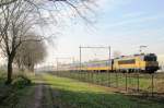 NS 1753 pushes an IC and passes Wijchen on 13 December 2013.