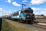 On 17 April 2021 TCS 101003 has pitted herself in front of a tank train at Oss and gets photographed from behind the gate.