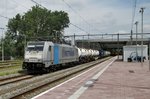 On 9 July 2016 Metrans 186 289 passes through Rotterdam Centraal with an eastbound intermodal.