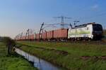 Dutch operator Kombi Rail Europe celebrates (more than) 15 years of cooperation with the Rotterdam Port Area and equipped her 2023 newby 193 106 with commemmorative stickers. On 24 October 2024 KRE's 193 106 hauls a fully loaded container train through Angeren near the Betuweroute freight artery. Sadly, this photo spot will be completely destoyed with the extension of the A15 motorway from Valburg toward the German border.