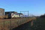 RFO 193 949 plus container train speeds through Tilburg-Reeshof on 10 January 2025.