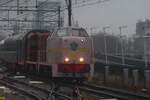 On a murky 15 December 2024 VSM's Bisshop 2530 hauls a speical train into Nijmegen.