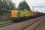 On a grey 4th of August 2024 RRF 24 hauls an engineering train through Nijmegen-Dukenburg and catches the photographer by surprise.