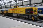 Strukton 303007 inspects the track at Amsterdam Centraal on 25 February 2017.