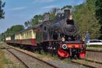 Former SJ 1040 stands with an extra train at Schin op Geul on 8 July 2017 during the ZLSM Steam Days.