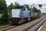 RTB V 156 hauls two wagons through Zwijndrecht on 16 July 2016.