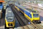 NS 186 002 enters Rotterdam Centraal on 26 March 2017, passing a V-IRM in the proces.