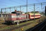 PKPSM 42-464 heads a stopping train of one coach at Poznan Glowny, 30 April 2011.