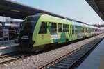 SA132-009 cals at Wolsztyn, advertising for green energy, on 4 May 2024, getting reduced in weight because many passengers alight at Wolsztyun for the steam loco parade.