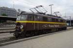 Brown Sugar? EU/EP07-169 stands idle at Poznan Glowny on 5 June 2013.