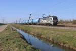 RFO 193 134 hauls a tank train through Valburg on 6 March 2025.