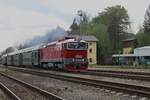 Slovak Brejlovec T478 3300 hauls a special train out of Luzna u Rakovnika toward Prague and firmly 'requests'any onlookers to celebrate 1 May (Labour Day) and 9 May (Anti-Fascist Victory Day) on 11