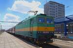 Retro-painted 163 107 standsa with an osobni to Poprad-Tatry in Kosice and enjoys the Sun on 23 June 2023.