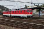 ZSSK 263 007 hauls a sister engine through Bratislava hl.st. on a grey 17 September 2024.