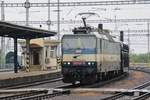 On a rainy 19 September 2017, ZSSK 363 140 hauls an automotive train through Bratislava hl.st.