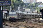 ZSCS 363 140 hauls a BLG block train through Bratislava hl.st. on 25 June 2022.