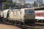 Budamars 383 213 hauls a cereals train through Bratislava hl.st.