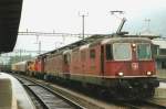 Scanned picture of 11245 with Re 6/6, a Tm 3/3, Am 841, railway engineering machine and the normal freight at Erstfeld on 26 May 2007.