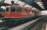 Scanned photo of SBB 1121 with an EC at Zürich HB, 18 June 2001.