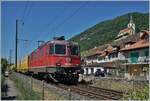 The SBB Re 4/4 II 11265 (Re 420 265-1) with a mail-service by Ligerz, on the last single track parat of the Biel/Bienne - Lausanne line. 

11.07.2025 
