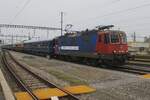 Ex-SBB Cargo 421 374 'THEOTISTE' hauls an extra train out of Yverdon-les-Bains on 31 December 2024.