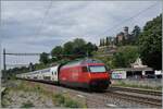 A SBB Re f460 with his IR 90 on the way to Genève Airport in Clarens .