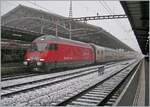 The first snow! The SBB Re 460 068-0  Gütsch  is waiting in Lausanne with its IR 90 1723 to depart for Brig.