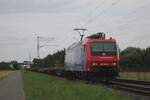 SBB Cargo 482 004 hauls an almost empty train (save for one brave tank container) through Kaarst Brociherheide on 8 August 2025 toward Köln-Eiffeltor.
