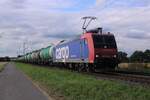 On 23 July 2025 SBB Cargo 482 014 hauls a tank train through Kaarst Broicherseite.
