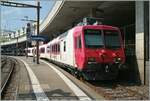 In Lausanne on the plattform 70 the ex TRAVYS RBDe 560 385 (RBDe 560 DO 94 85 7 560 385-7 CH SBB) is waiting his departure to Kerzers.