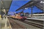 A sweet surprise at the end of the day: In Lausanne on platform 2 is the TPF RBDe 560 245  CHOCOLAT EXPRESS  as an empty material train.