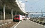 The former TRAVYS RBDe 560 384, still operating with its B and ABt in the attractive Travys livery (but with SBB lettering), arrives in Lausanne on track 70 as a regional train from Kerzers.