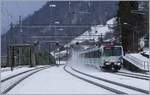 The SOB RBe 561 083-7 wiht his Voralpenexpress is arriving at Immensee.