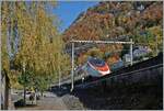 Against the backdrop of a colorful autumn landscape near Chillon Castle, an SBB RABe 503 train travels as an EC from Milan to Geneva.

November 4, 2025