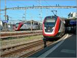 Two SBB RABe 502 Twindexx in Lausanne, one as IR 15 to Lucerne (right in the picture) and the other (in the background) as IC 1 from St.