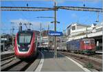 While the SBB Re 6/6 11622 (Re 620 022-4)  Suhr  waits in the background in Lausanne for its onward journey, an SBB RABe 502  Twindexx  has arrived on plattform 4 as an IC1. This train is en route from St. Gallen to Geneva Airport.

11.11.2024
