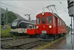 The RB Draisine Dm 2/2 N° 3  Biniou  of the Blonay-Chamby Railway appears tiny between the CEV MVR ABeh 2/6 N° 7503  Blonay-Chamby  and the RhB ABe 4/4 I N° 35 of the Blonay -Chamby