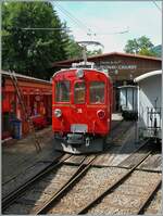 The Blonay-Chamby steam service is arriving at the Chaulin station and give a view on the RhB AB 4/4 N° 35 (by the B-C).