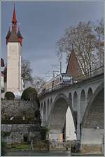 An AVA BDWM ABe 4/8  Diamant  on the Reuss Bridge in Bremgarten. 

06.12.2024