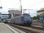 On 7 June 2009 BLS 465 007 hauls an intermodal train through Spiez.