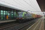 BLS Cargo 475 428 hauls a container train through Tilburg-Reeshof on 18 January 2025.