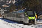 BLS MIKA 528 129 departs from Kandersteg with a stopping train to Bern on 1 January 2025.