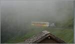 By a heavy fog is the BLM Be 4/6 102  Mönch  by Winteregg on the way to Mürren.