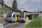 The BLM Be 4/6 102  Mönch  on the way from Mürren to Grütschalp (on the right) and the BLM Be 4/6 101  Eiger  on the way from the Grütschalp to Mürren (on the right) in the Winteregg station. 

08.08.2024