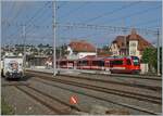 Surprisingly, the new CJ ABe 4/12 672 (Be 2/4 - B - Be 2/4 672) drives through the Le Noirmont train station as a test drive.