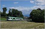 The LEB RBe 4/8 41 is on its way to Lausanne Flon and has left the small train station of Jouxtens-Mézery.