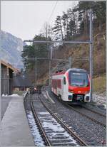 RABe 533 701 departs Sembrancher as train R82 towards Orsières.