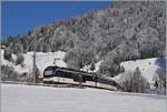 With one of the two Ast control cars at the head and the MOB  Alpina  ABe 4/4 9302 pushing, the MOB regional train PE 30 2218 is near Les Avants on the way from Montreux to Zweisimmen. 

Jan 3, 2025